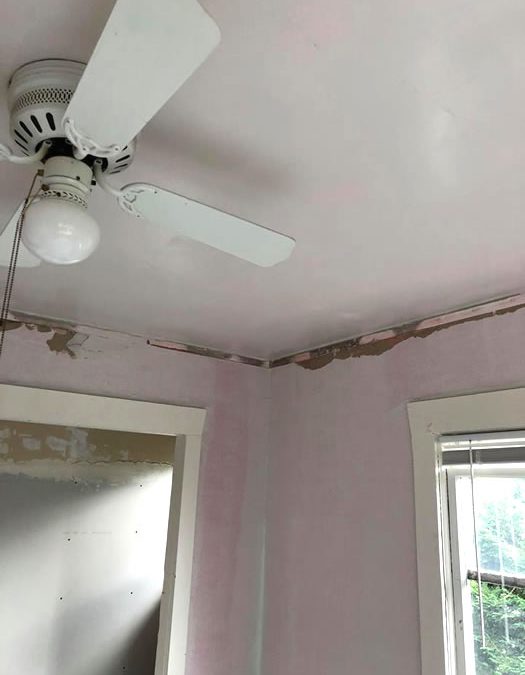 Ceiling and wall plaster damage.