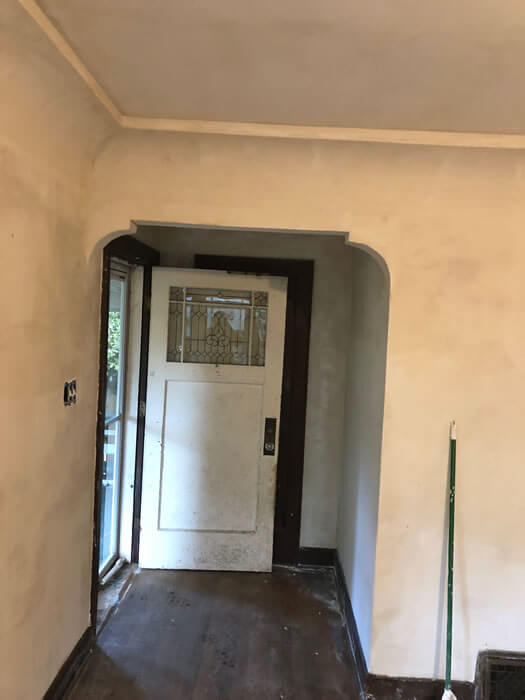 Entry way after repairing and skimming plaster.