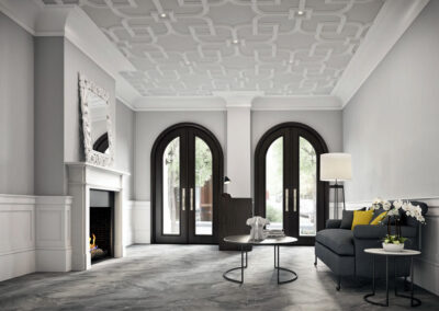 The tall ceilings call for tall crown molding. The ornate custom plaster ceiling molding is trimmed with smooth crown molding for an elegant look.